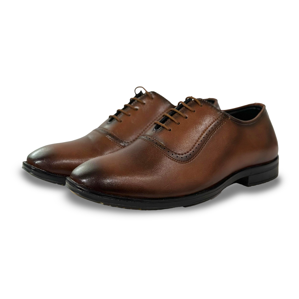 Pair of brown leather dress shoes on a white background
