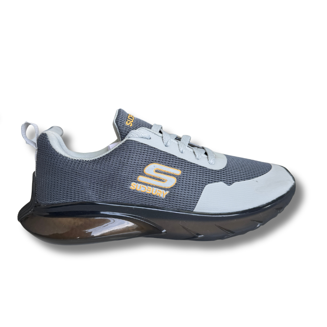 Gray and white sneaker with 'Skechers' branding on a white background