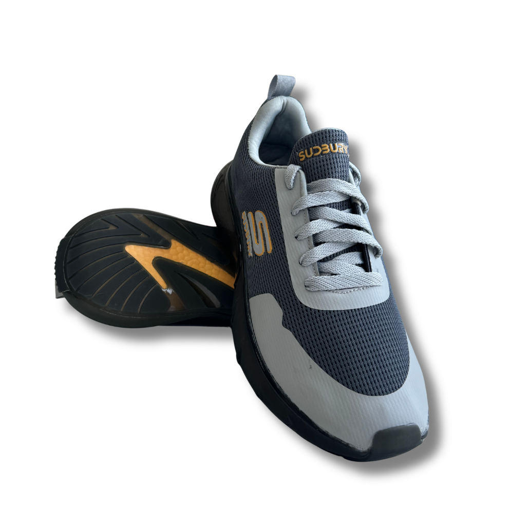 Gray and black sneakers with a brand logo on a white background