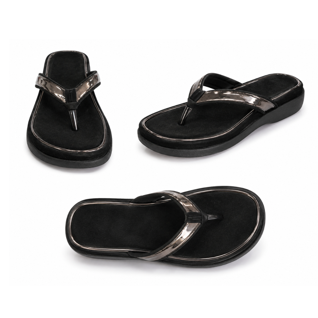 Black sandals with metallic straps on a white background