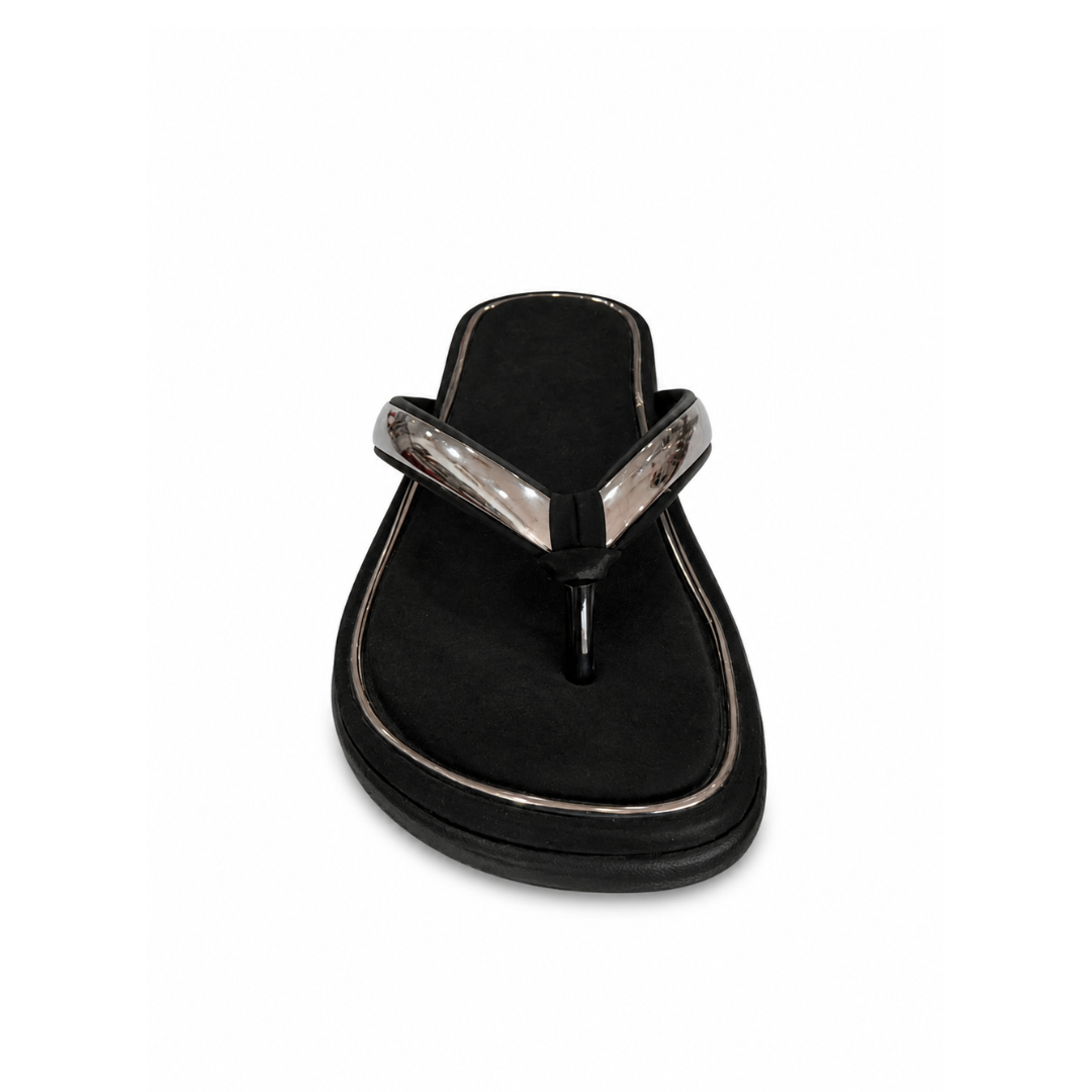 Black sandal with a metallic strap on a white background