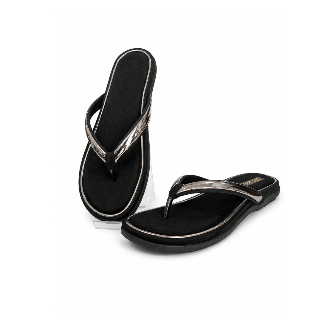 Black flip-flops with metallic accents on a white background